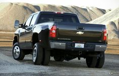 the back end of a black pickup truck