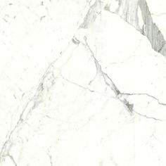 a white marble textured surface with grey veiners