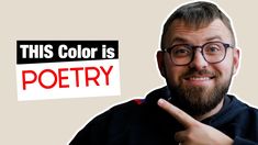 a man with glasses pointing to his right and the words'this color is poetry'above him