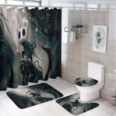 the bathroom is decorated in black and white with an image of a ghost on it