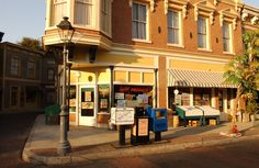 an image of a street corner with buildings in the background