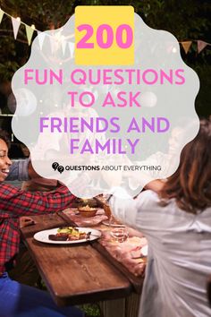 people sitting around a table with food on it and the words 200 fun questions to ask friends and family