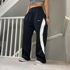 Vintage rare Nike Oversized fit wide leg soft Track Pants tracksuit bottom with popper hem   Tag says XL and sizing is flexible due to drawcord waist, unisex 32" inner leg Seen on size 10uk, 5'4" height With small stain on the side as shown but overall Good condition  joggers sportswear trackie track-pant tracksuit bottom sweatpants casual streetwear baggy pants parachute pants y2k 00s gymwear activewear unisex  68 Pants Y2k, Rare Nikes, Nike Vintage, Baggy Pants, Baggy Pant, Casual Streetwear, Gym Wear, Vintage Nike, Oversized Fits