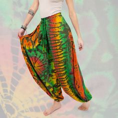 ☮️ Tie Dye Harem Pants The classic hippie style of harem pants has gotten a bold tie-dye makeover! Not only are these pants known for their level of comfort and freedom, but now they come in a spectacular array of patterns and colors. Find them at Hippie Shop! #HippieShop #HippieStyle #BohoStyle #Hippie #Hippy Buffalo Sandals, Tie Dye Harem Pants, Hippie Shop, Cotton Cargo Pants, Army Cap, Hippie Style, Workout Pants, Suede Leather, Harem Pants