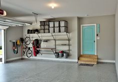 the garage is clean and ready to be used as a storage area for bicycles or other things