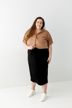 Everyday glam doesn't get easier than the pull on Sasha skirt! It's effortless and elegant - what skirt dreams are made of! Tailored in a modern midi length, this soft knit skirt is fitted with a hidden elastic waistband for a secure fit. From everyday wear to business casual to Sunday morning - this basic skirt is a must have for every modest wardrobe! Exclusively designed with you in mind. 95% Rayon 5% Spandex Hand Wash Cold Do Not Bleach Lay Flat or Hang to Dry Low Iron if Needed Lined Model Casual Stretch Maxi Skirt For Loungewear, Chic Spring Maxi Skirt For Loungewear, Chic Summer Maxi Skirt For Loungewear, Chic Summer Loungewear Maxi Skirt, Chic Relaxed Fit Maxi Skirt With Elastic Waistband, Chic Maxi Skirt With Elastic Waistband And Relaxed Fit, Stretch Maxi Skirt With Elastic Waistband For Daywear, Flowy Mid-length Lined Skirt, Mid-length Flowy Lined Skirt