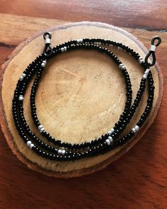 Luxury handmade glasses/sunglasses holder chain made with black and silver glass seed beads. Beaded Glasses Chain, Eyeglass Jewelry, Beaded Glasses, Eyeglasses Holder Necklace, Beaded Sunglasses, Glasses Chains, Sunglasses Holder, Beaded Lanyards, Sunglass Chain