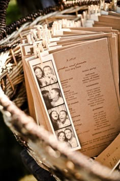 a basket filled with lots of cards and pictures