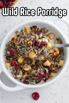 wild rice porridge with cranberries and nuts in a white bowl