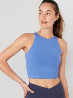 Be poised with every pose in our PowerChill yoga sports bra tank, the perfect balance between om and OMG-softness Crew neck.  Sleeveless arm openings.  Built-in shelf bra, with soft, removable cups for shaping & secure coverage.  Interior front mesh Athleisure Tops With Built-in Cups For Workout, Racerback Tops With Built-in Padding And Medium Support, Sleeveless Workout Tops With Built-in Cups, Sports Tops With Built-in Cups And Stretch, Sporty Workout Tops With Built-in Cups, Casual Sleeveless Tops With Built-in Padding, Casual Racerback Tops With Built-in Padding, Casual Stretch Tops With Built-in Padding, Sporty Racerback Activewear With Built-in Cups