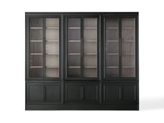 an empty black bookcase with glass doors