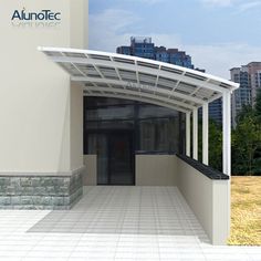 an empty building with a white roof and some trees in the background