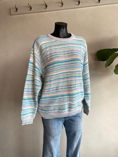 "Vintage Benetton Italian Spring Textured Knit Pullover Sweater. Striped patterned with pastel like multicolor design. Made in Italy from 100% cotton fibers. Mediumweight feel, perfect for spring! Condition overall is great with no noted flaws. No rips, tears, or staining. Please see all photos for details.  Refer to measurements below to ensure a proper fit (modeled on a size large mannequin) 22.5\" pit to pit 20\" shoulder to shoulder 23\" sleeves 27\" length" Spring Multicolor Cotton Sweater, Colorful Cotton Casual Sweater, Colorful Casual Cotton Sweater, Colorful Cotton Spring Sweater, Casual Colorful Cotton Sweater, Knitted Pullover Sweaters, Textured Knit, Pullover Sweater Women, Knitted Pullover