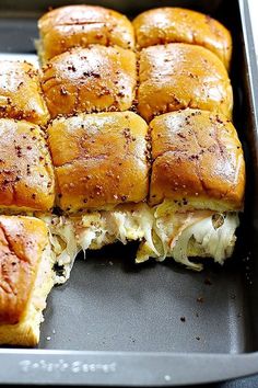 a pan filled with lots of food on top of a table