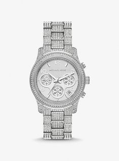 The ultimate finishing touch for everyday glamour, our new Runway watch is defined by a shimmering pavé-encrusted bezel and bracelet strap to dial up the drama. Updated with raised sub dials, this dazzling style is crafted from silver-tone stainless steel and features chronograph details for precise timekeeping. Wear it alone, or stacked for next-level arm candy. Mk Watch, Pave Bracelet, Silver Watches Women, Top Rings, Wren, Steel Watch, Stainless Steel Watch, Jewelry Rings Engagement, Watch Brands