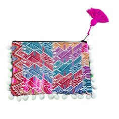 These one-of-a-kind, eco-friendly clutches are up-cycled from traditional, embroidered blouses of Mayan women in Guatemala. They are adorned with colorful pompoms. Your Fair Trade purchase helps to economically empower women artisans, improve quality of life and preserve tradition and cultural legacy. As each piece is one-of-a-kind, please specify the colors you would like and we will do our best to send you the perfect bag for you!Colors vary - please specify pink tones/earth tones/blue-green t Bohemian Multicolor Clutch With Zipper Pouch, Multicolor Woven Bohemian Clutch, Multicolor Tassel Clutch For Everyday, Embroidered Multicolor Pouch For Festival, Mayan Women, Embroidered Blouses, Improve Quality Of Life, Empower Women, Green Tones