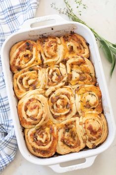 a casserole dish filled with cinnamon rolls