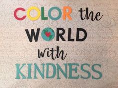 the words color the world with kindness on a white background