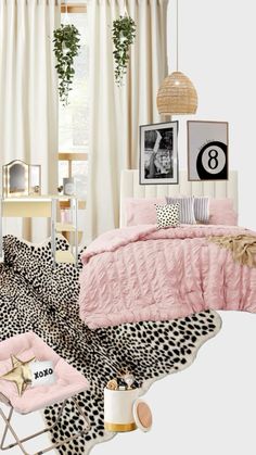 a bedroom decorated in pink, black and white with leopard print rugs on the floor