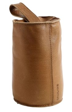 a brown leather cup holder with a strap