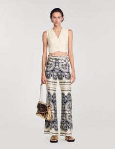 Teylor, Beige / Navy, | sandro-paris.com Womens Flowy Pants, Paris Clothes, Monsieur Madame, Satin Trousers, Black Cropped Pants, Sandro Paris, Flowy Pants, Jumpsuit Trousers, Printed Pants