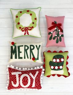 Wreath, mistletoe, mitten, Merry, Joy appliquéd pillows featured in the Mini Holiday Pillows Sewing Pattern Pillows Sewing, Cozy Holiday Decor, Holiday Sewing, Applique Pillows, Christmas Pillows, Paper Sewing Patterns, Sewing Pillows, Holiday Pillows, Christmas Sewing