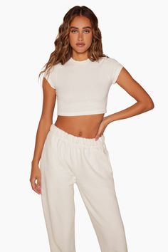 LOUNGE MINI CARDIGAN - BLANC Fitted White Cropped Top, White Fitted Top With Cropped Hem, Fitted White Top With Cropped Hem, White Fitted Crop Top With Cropped Hem, Sporty Fitted Cropped Shirt With Crew Neck, Solid Athleisure Cropped T-shirt, Cropped T-shirt For Athleisure, Solid Cropped T-shirt For Athleisure, White Stretch Cropped Shirt