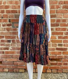 The perfect grunge fairycore skirt with multi-toned patches. Great for the summer and perfect transition piece for the fall. Looks great with sandals but also with tights and boots. Versatile and fits comfortably with an elastic waist. One size S - L Measurements Waist 22-42in Length 24in This is a sample photo, all skirts are unique Please message with any questions Bohemian Skirted Patchwork Bottoms, Bohemian Mini Skirt With Patchwork, Hippie Patchwork Fitted Skirt, Vintage Patchwork Tiered Skirt, Bohemian Brown Patchwork Skirt, Grunge Fairycore, Patchwork Skirt, 90s Aesthetic, Tights And Boots