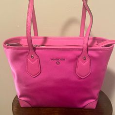 Michael Kors Tote Bag Eve Cerise Inside Pocket.Trimming Leather. Medium Sized Bag; 15-1/2"W X 10"H X 5-1/2"D Pink Michael Kors Shoulder Bag With Top Carry Handle, Classic Pink Bag For Errands, Michael Kors Tote Shoulder Bag For Errands, Pink Michael Kors Shoulder Bag For Errands, Michael Kors Bags For Errands, Michael Kors Pink Bag For On-the-go, Michael Kors Large Capacity Shoulder Bag For Errands, Medium On-the-go Shoulder Bag, Classic Pink Michael Kors Shoulder Bag