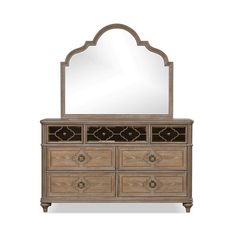 an ornate dresser with mirror on top and drawers below it, against a white background