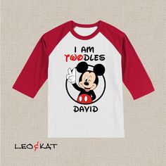 a red and white mickey mouse t - shirt with the words i am noodles david on it