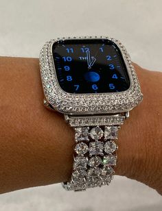 This Silver Apple Watch band or Apple Watch Case is compatible with all Apple Watch Series (2-9 SE), including 38mm, 40mm, 41mm, 42mm, 44mm, 45mm, and Ultra 49mm models. Products are designed by Iwatch Candy and made custom to our specifications. Add a touch of glamour and sophistication to your Apple Watch with our stunning jewelry style watch bands and apple watch cases. Perfect for everyday wear or special occasions, they feature sparkling high quality crystals or lab created diamonds. These Apple Watch Cover, Custom Apple Watch Bands, Diamond Grillz, Mens Bling, Apple Watch Bands Fashion, Bling Things, Apple Watch Bands Women, Apple Watch Fashion, Apple Watch Sizes