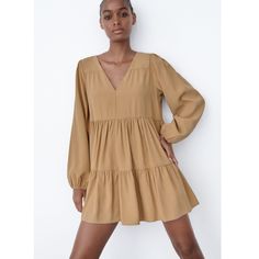 Zara Tiered Mini Dress Details: V-Neck Dress With Long Sleeves And Elastic Cuffs Color: Light Camel Outer Shell: 93% Viscose,7% Polyester Approx. Measurements Laying Flat: 21.5"(Armpit To Armpit) 22.5"(Waist) 30.5"(Shoulder To Hem) Brand New With Tag Flowy V-neck Mini Dress For Fall, V-neck Mini Dress For Fall Brunch, Beige V-neck Mini Dress For Brunch, Zara V-neck Midi Dress With Ruffles, Beige V-neck Mini Dress For Date Night, Zara V-neck Dresses For Fall, Zara V-neck Midi Dress For Brunch, Zara V-neck Midi Dress For Day Out, Zara V-neck Dress For Day Out