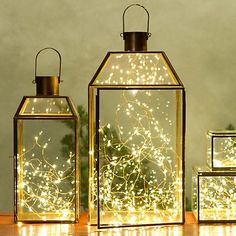 a screen shot of a website page with an image of christmas lights in glass containers