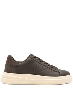 cedar brown calf leather smooth grain front lace-up fastening contrasting heel counter debossed logo to the side logo patch at the tongue round toe branded insole flat rubber sole Brown Lace-up Sneakers With Embossed Logo, Brown Leather High-top Sneakers With Perforated Toe Box, Brown Low-top Sneakers With Embossed Logo, Brown Leather Sneakers With Embossed Logo, Debossed Logo, Balenciaga Track, Brown Sneakers, Balenciaga Triple S, Custom Watch