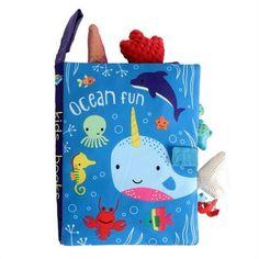 a blue bag with an ocean fun design on the front and bottom, along with sea animals