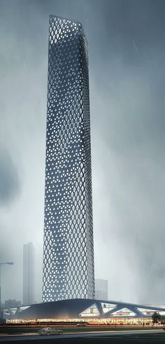 a very tall building with a lot of windows on it's side in the rain