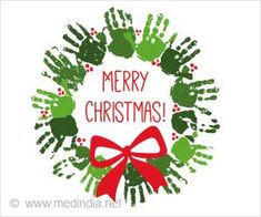 a christmas wreath with hand prints and a red bow around it that says merry christmas