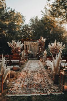 an outdoor ceremony with pamodia and pamodia flowers