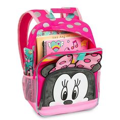 Cuteness has arrived with this adorable backpack featuring everyone's favorite sweetheart Minnie Mouse. The front panel features a peeking Minnie, complete with ears and bow. It's roomy inside and comfortable to wear. How sweet is that? Magic in the details... Minnie Mouse screen art on front zip pocket Main compartment with double zip top closure Three fabric zipper pulls Mesh interior accessory pocket with self-stick fabric fastener, three pen holders and additional pocket Top carry handle Acc Minnie Mouse Baby Room, Minnie Mouse Toys, Minnie Mouse Backpack, Minnie Mouse Images, Minnie Mouse Costume, Xmas Toys, Screen Art, Barbie Fashionista Dolls, Minnie Mouse Pink