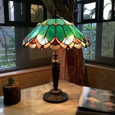 a lamp sitting on top of a wooden table