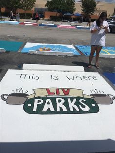 this is where live parks are painted on the ground in front of a parking lot