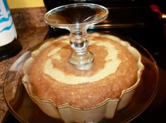 a cake sitting on top of a glass plate