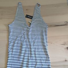 Questions? Leave A Comment Below! New With Tags Cute Stripe Top For Summer White With Navy Blue Affordable Blue Zara Tank Top, Stripped Tank Top, Summer White, Top For Summer, Stripe Top, White Summer, Blue White, Navy Blue, Blue And White