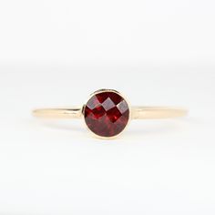 Genuine Garnet Ring made with 14K gold filled. Also available in .925 sterling silver. Crafted with love and attention to detail, these rings are made of high-quality 14k gold filled with a beautiful finish. They effortlessly blend durability with a refined aesthetic, ensuring they will be cherished for years to come. 💛 The colors will not chip off or fade and can be worn in water. This ring is made to order in your size. If you don't see your size available please feel free to message me. **St Stackable Birthstone Rings, Refined Aesthetic, January Birthstone, Garnet Ring, Garnet Rings, Faceted Gemstones, Stacking Ring, Engraved Rings, Stackable Rings