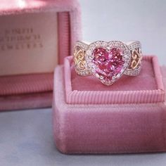 Passionately pink. Custom designed two tone pink sapphire halo ring. Luxury Pink Rings For Formal Occasions, Engagement Ring Pink, Luxury Pink Ring Jewelry, Black And Pink Wedding Rings, Luxury Pink Heart Cut Jewelry, Luxury Pink Heart Cut Ring, Elegant Pink Heart-shaped Ring, Pink Wedding Rings, Bridal Necklace Designs