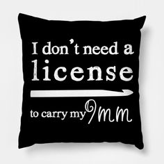 a black pillow that says i don't need a license to carry my mm