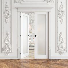 an empty room with white walls and wood flooring is seen from the doorway to the entrance