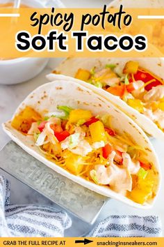 Spicy soft potato tacos in a metal holder with a text overlay. Potato Soft Tacos, Soft Taco Recipe, Soft Tacos Recipes, Vegetarian Tacos Recipes, Vegetarian Taco, Greek Yogurt Sauce, Paprika Potatoes, Cubed Potatoes, Taco Recipe