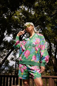 Florals for spring? Groundbreaking. Jumbo technicolor florals on a breezy nylon pullover and shorts.